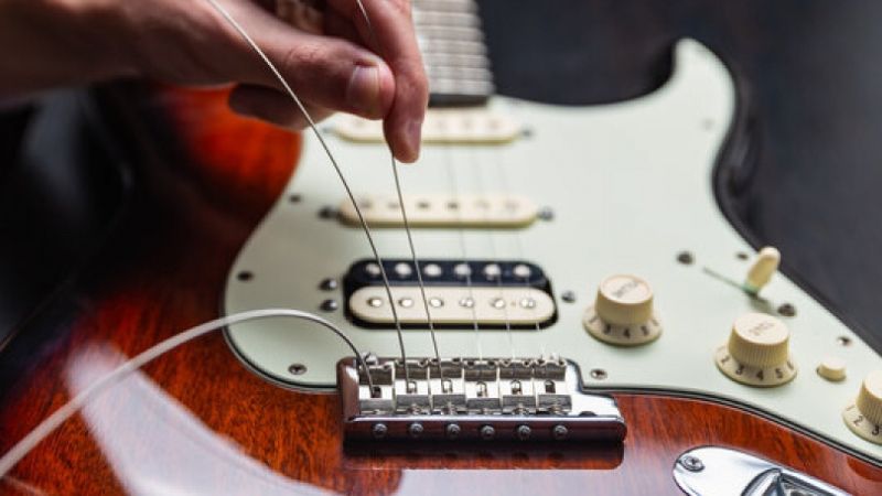 Replacing strings on an electric guitar